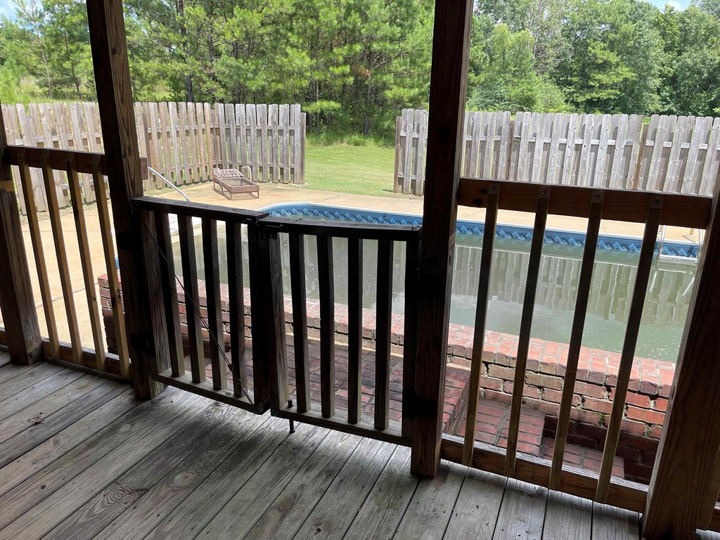 Back porch overlooking Pool and patio